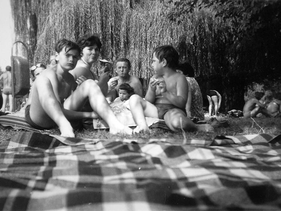 A family sharing the stories behind their photos